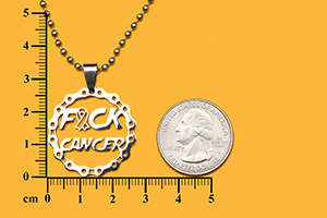 F*ck Cancer pendant inside bicycle chain circle
