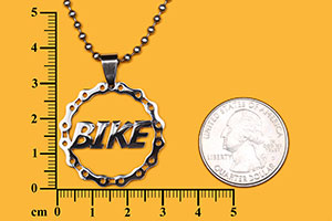 negative space bicycle pendant