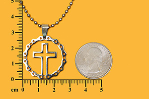 Cross pendant inside bicycle chain circle